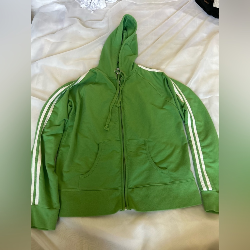 Green jacket with white lines